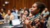 woman speaking at a forum